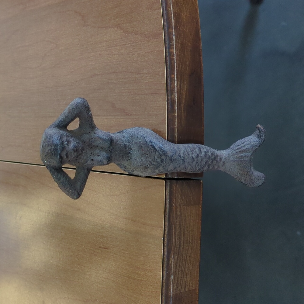Tr cast iron mermaid